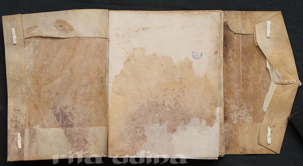Medieval manuscript with limp vellum binding on reverse parchment, with flap